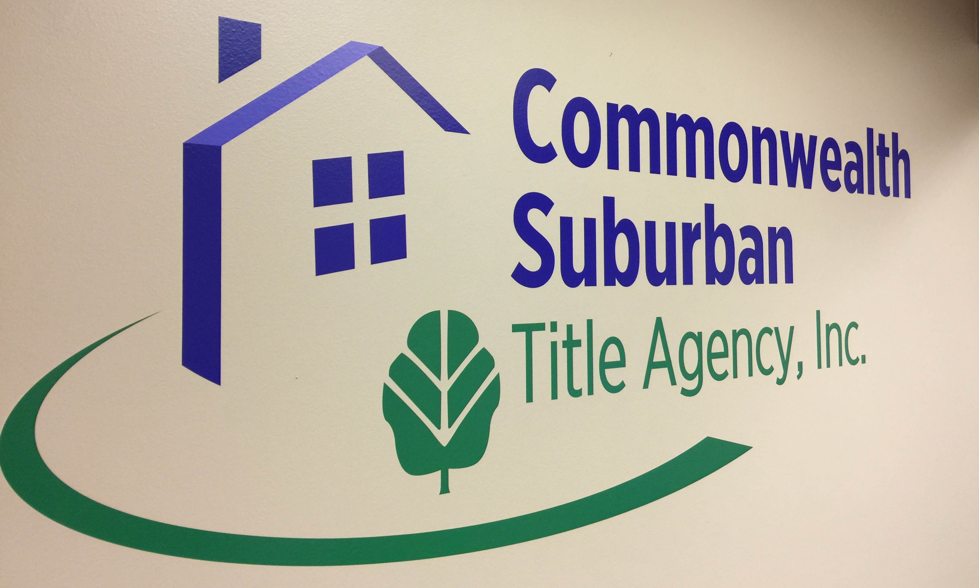 Commonwealth Suburban Title Agency Logo located on a wall within one of our several office locations
